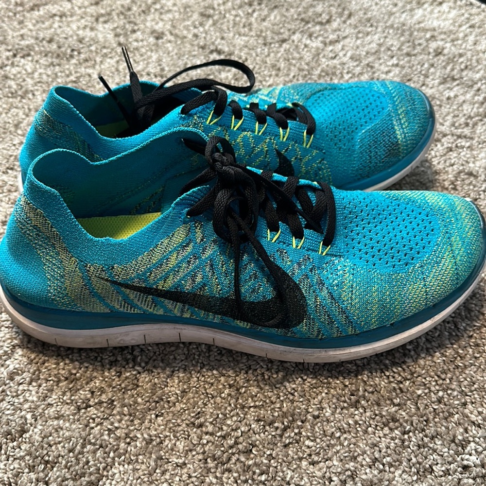 Nike Free 4.0 Flyknit Running Shoes  Mens size 9.5/women’s size 11